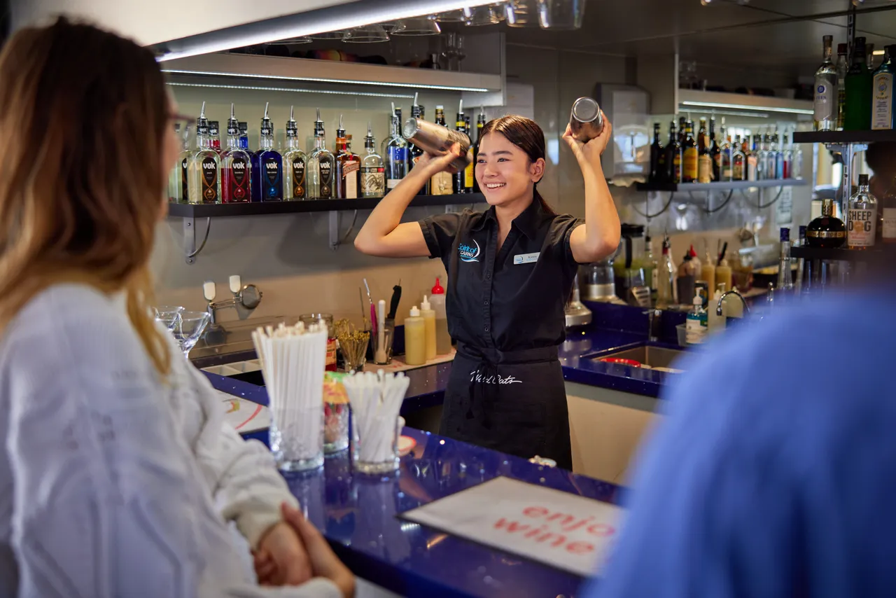 Staff making cocktails on Spirit of Cairns (2)