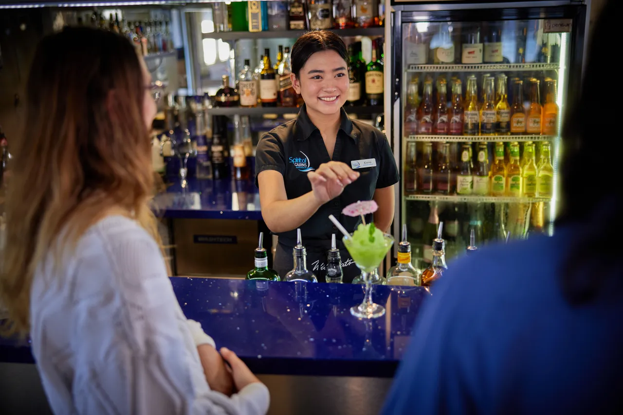 Staff making cocktails on Spirit of Cairns (1)