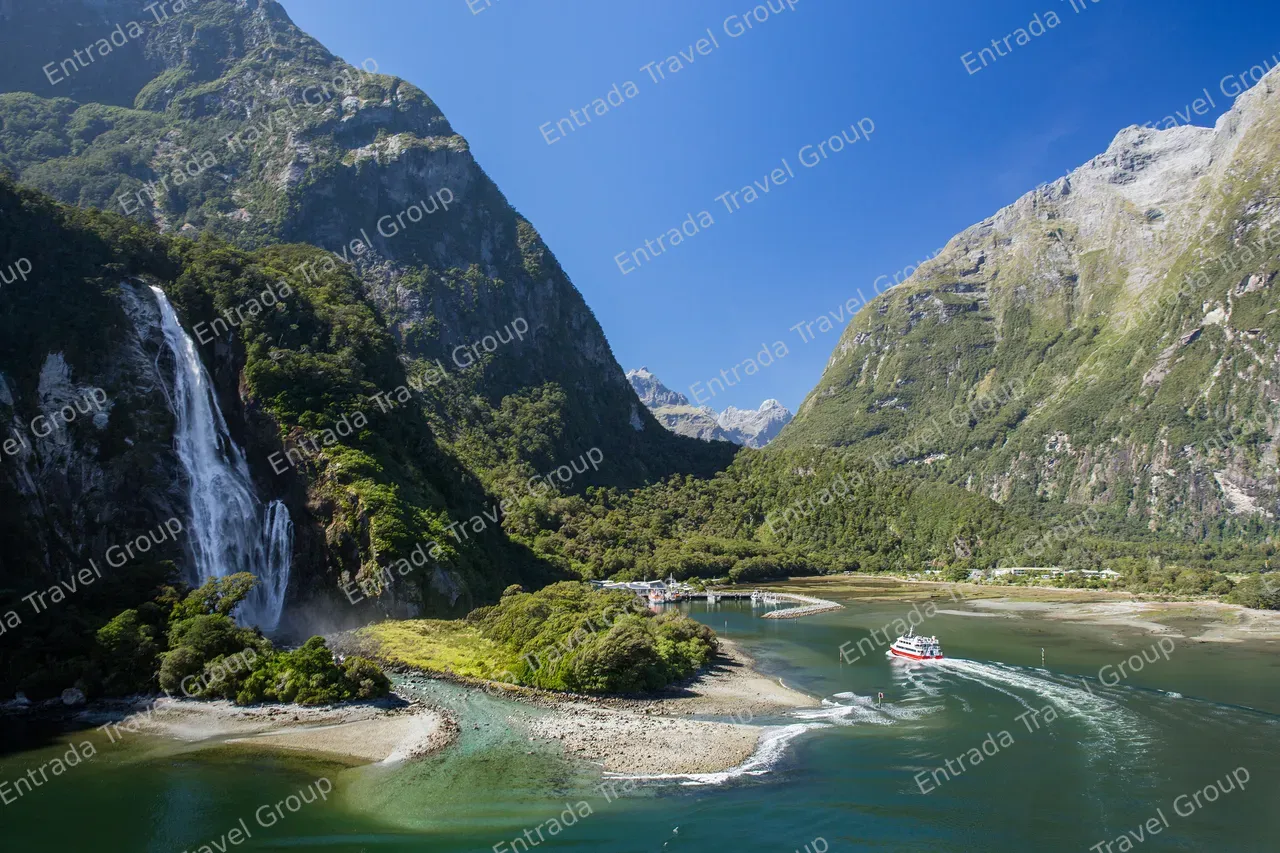 Milford-Sound-Scenic-Cruise-passing-the-Bowen-Falls-waterfall