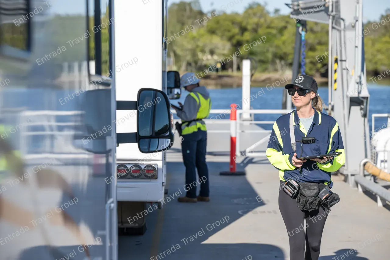 Noosa North Shore Ferries - Staff checking passenger tickets 6