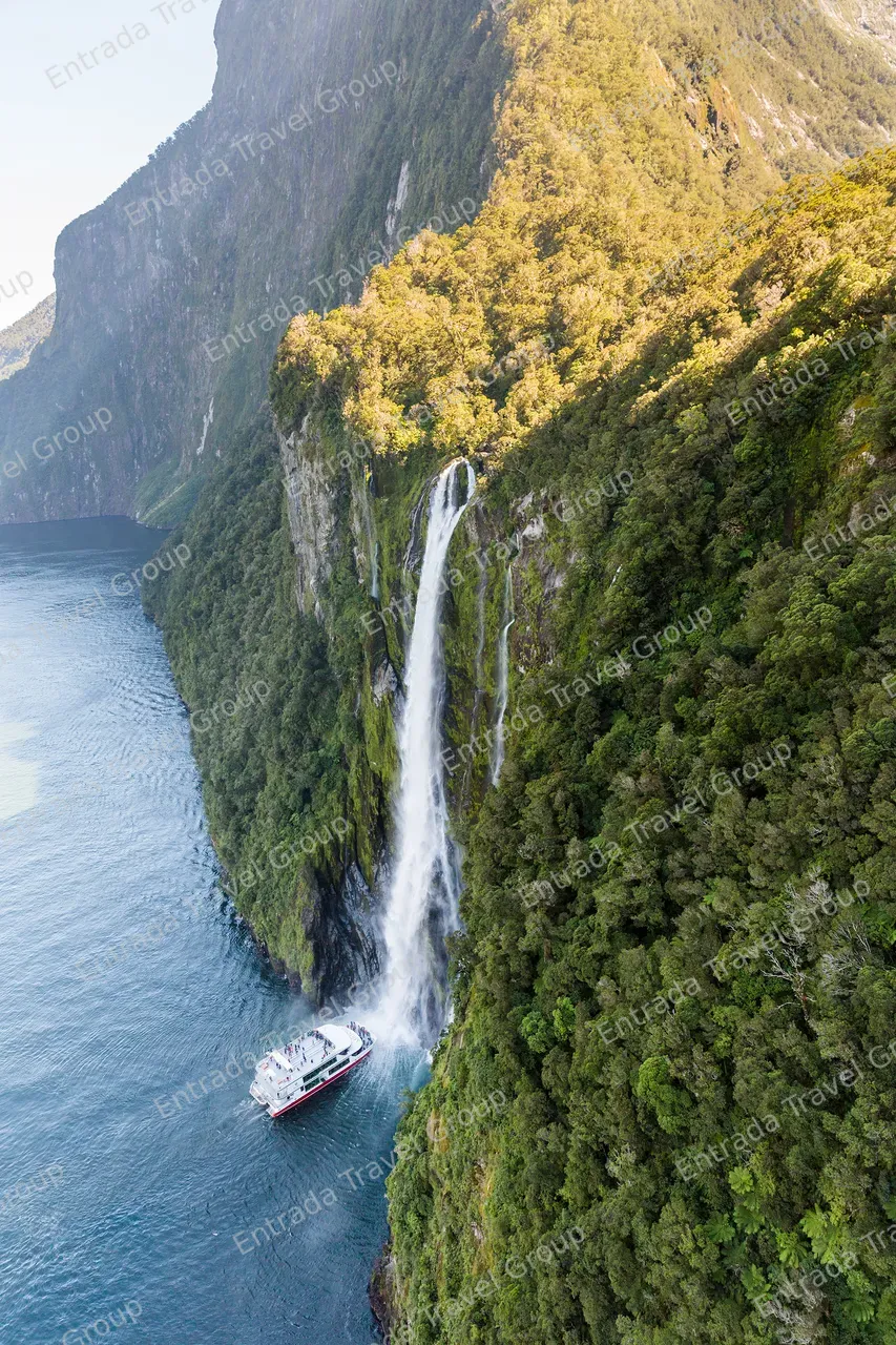 Milford-Sound-Scenic-Cruise-getting-close-to-the-Stirling-Falls-waterfall-print