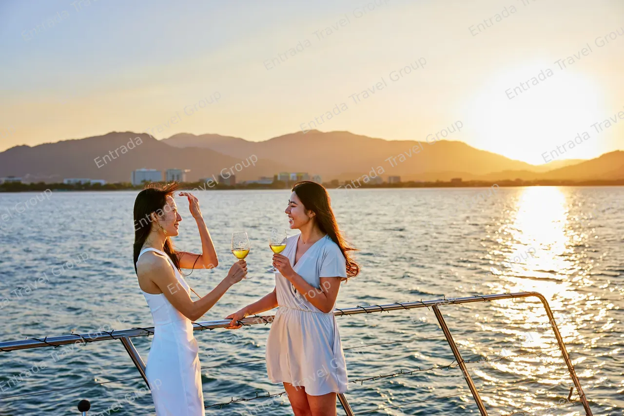 Ladies having a drink on the deck of Spirit of Cairns
