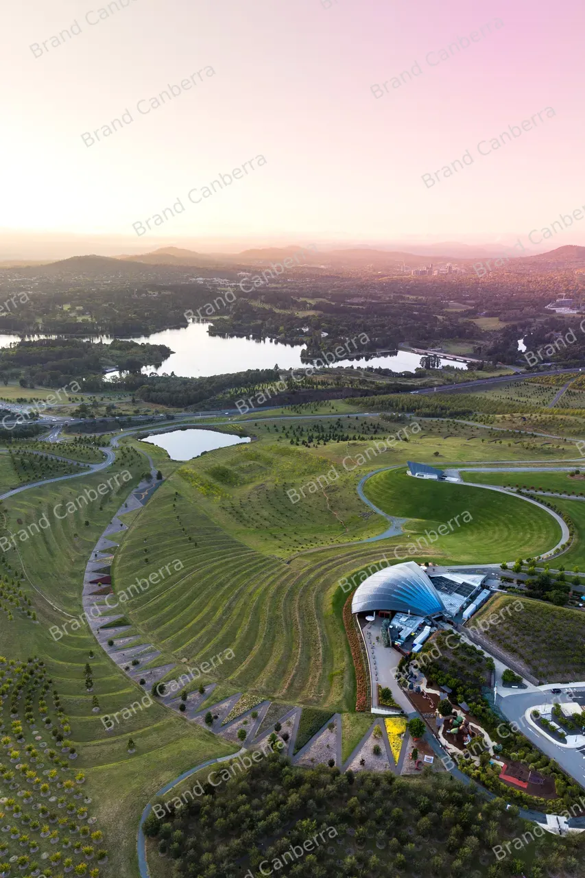 Aerial view of National Arboretum and Lake Burley Griffin at sunrise