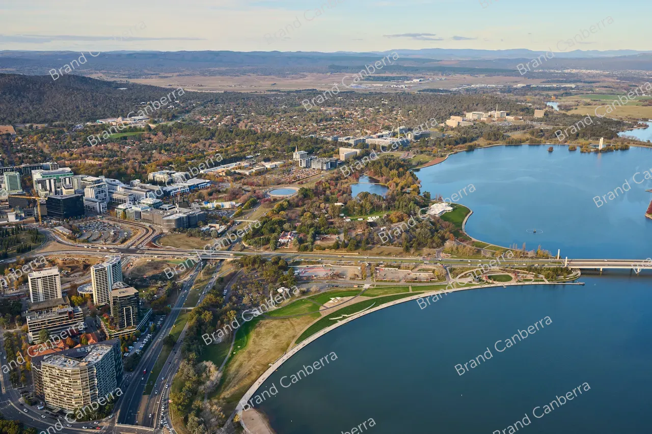 An aerial view over Canberra facing east with Acton Waterfront and Lake Burley Griffin in view
