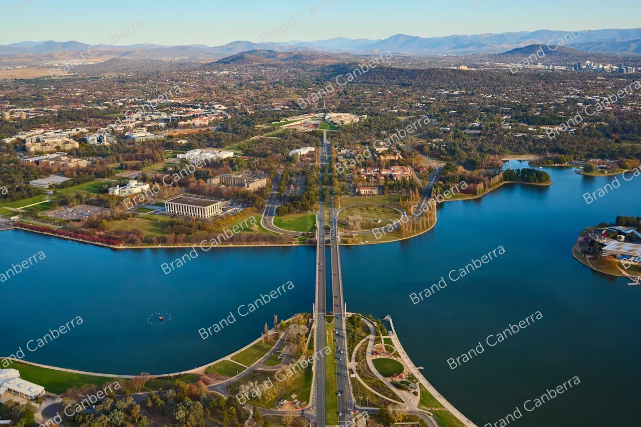 An aerial view over Canberra along Commonwealth Avenue bridge with Australia's Parliament House in view (2)