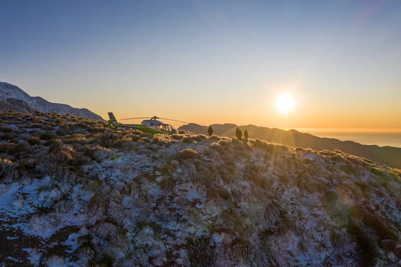 South Pacific Helicopter Mountain View Snow Sunset