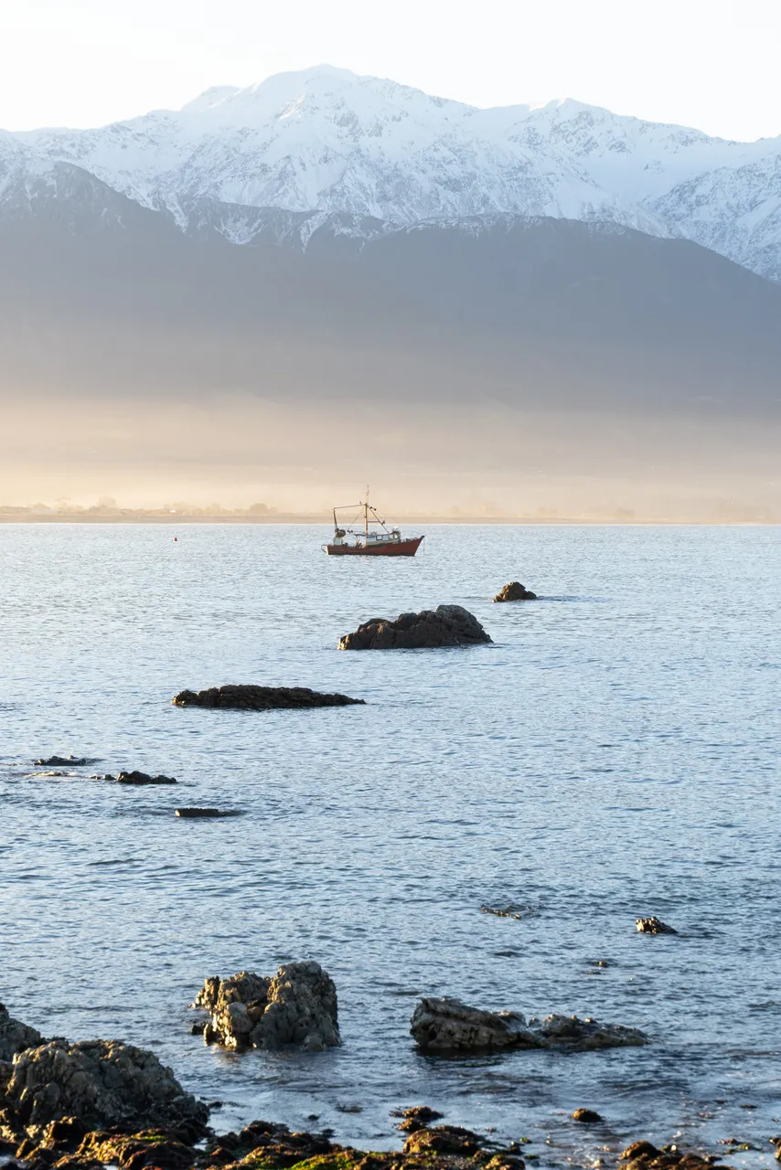 Seascape Boat Snow on mountains