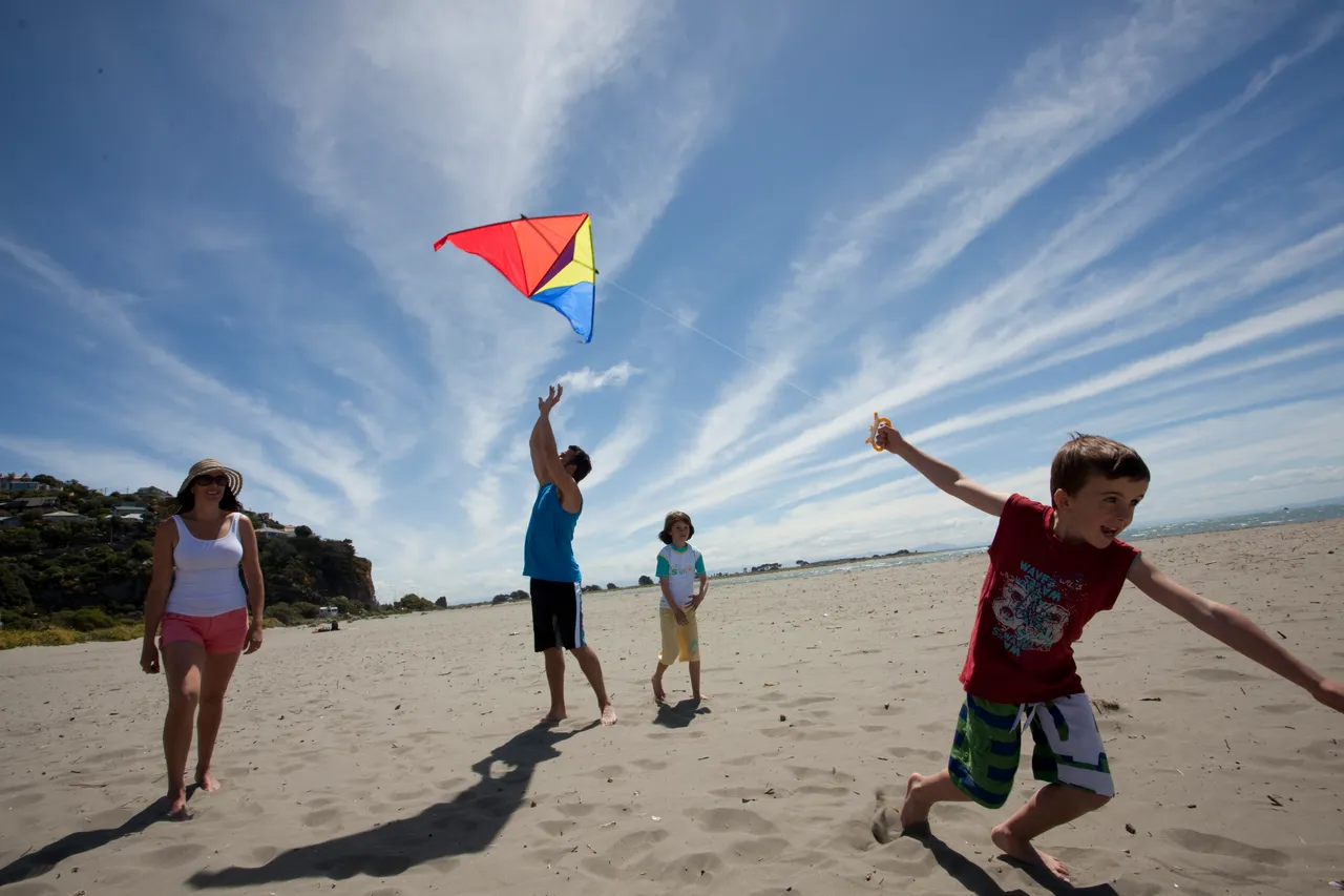 Flying kites at Sumner Beach