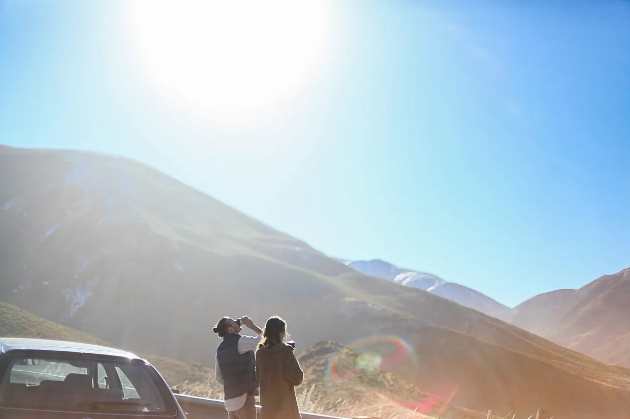 Couple taking in the scenery on the Great Alpine Highway
