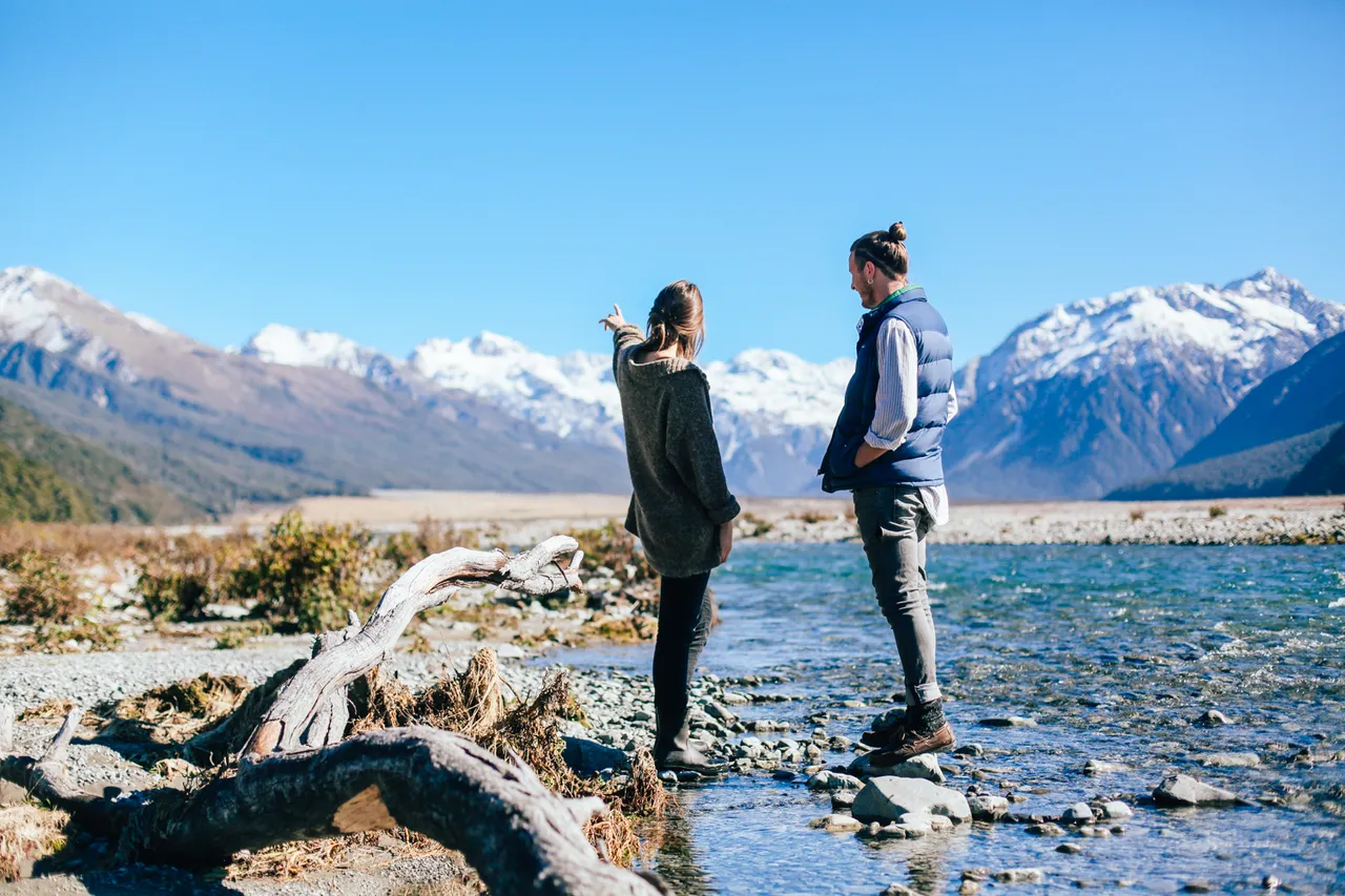 Couple sightseeing by the Waimakariri River