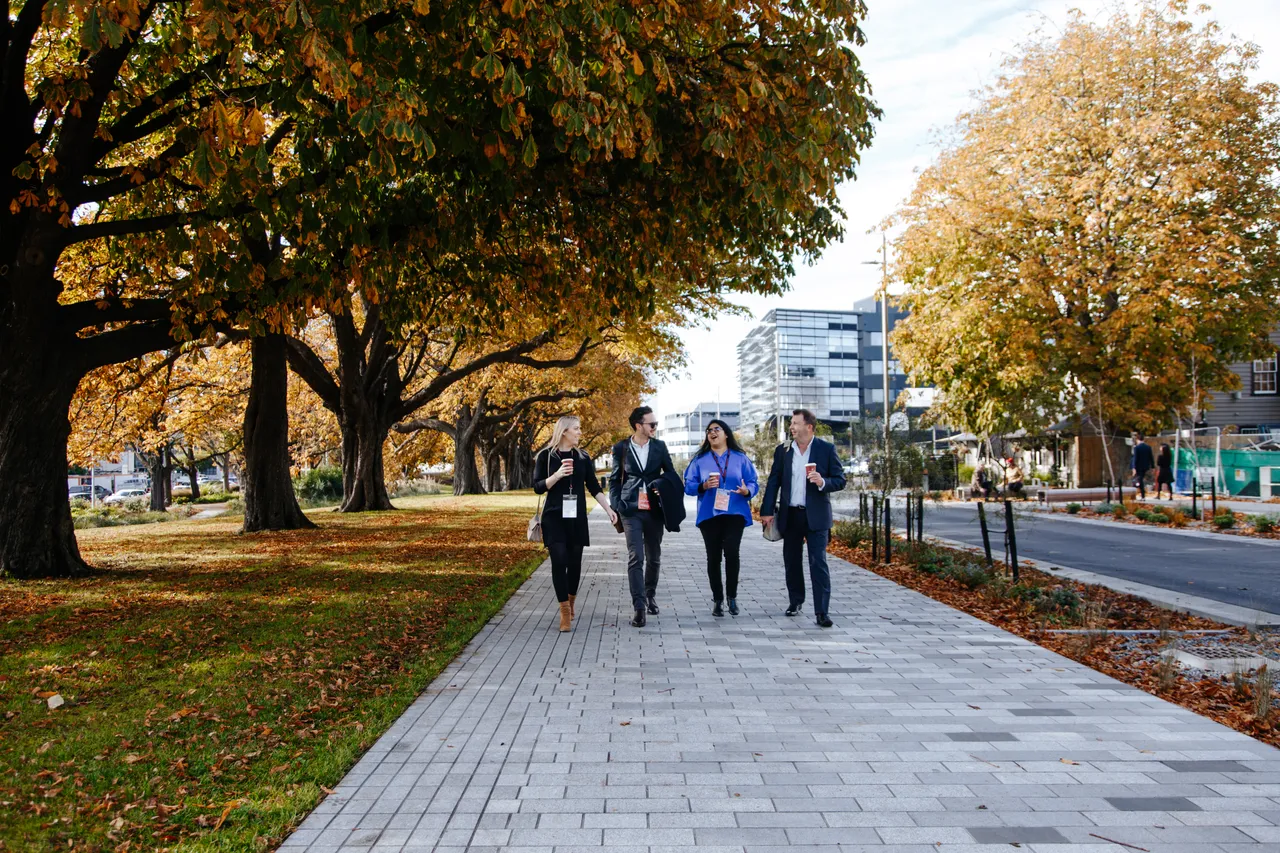 Conference delegates walking along Oxford Terrace in Autumn