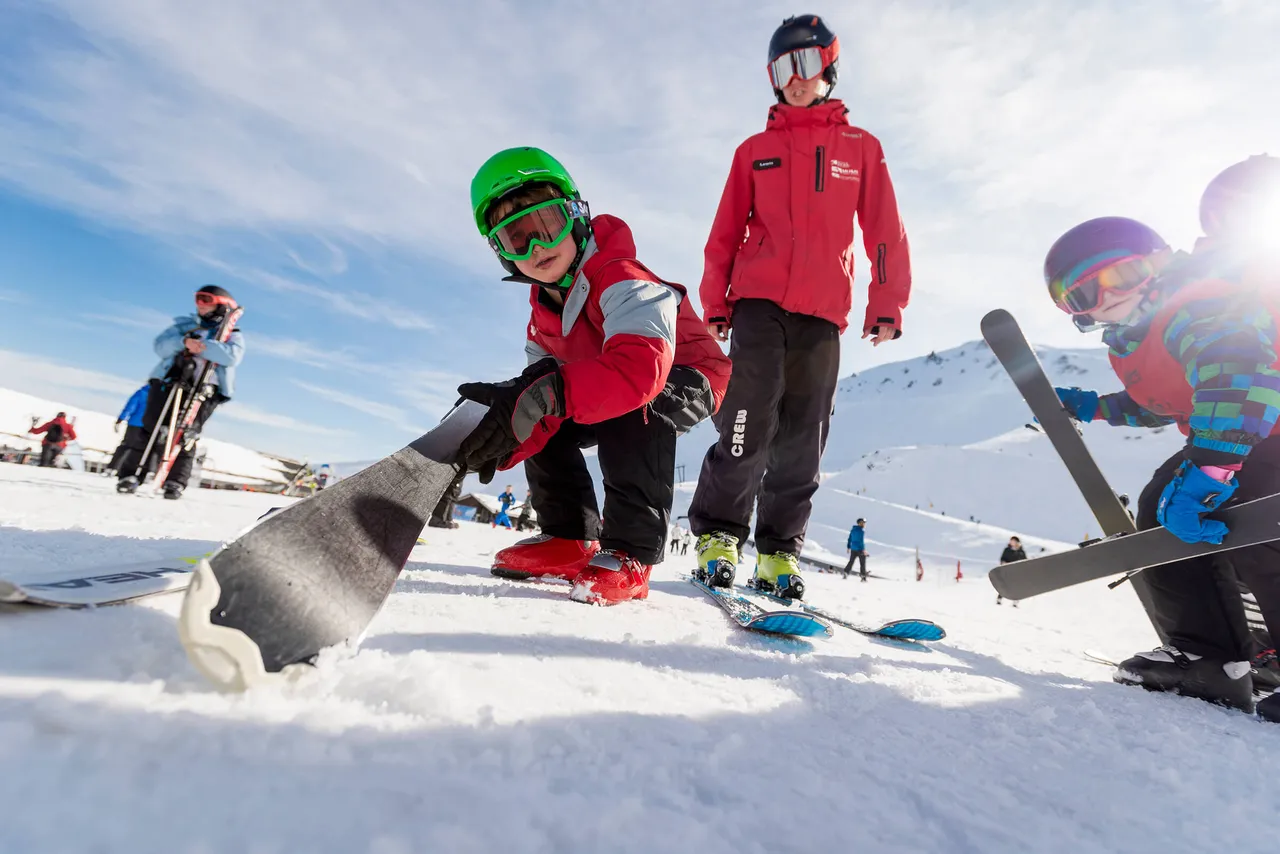Mt Hutt Kids Playing with Skis on Snow