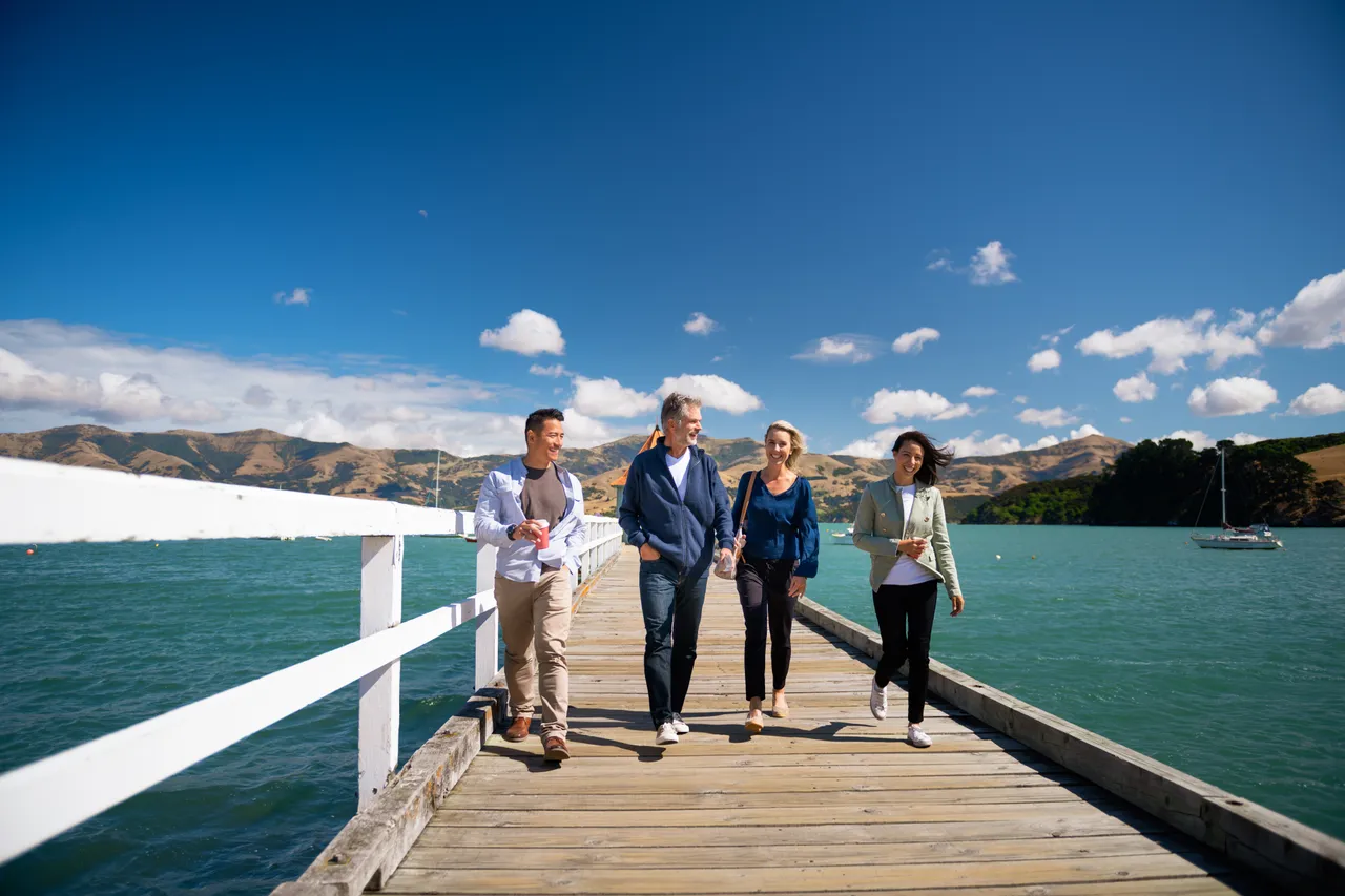 Akaroa - delegates on jetty