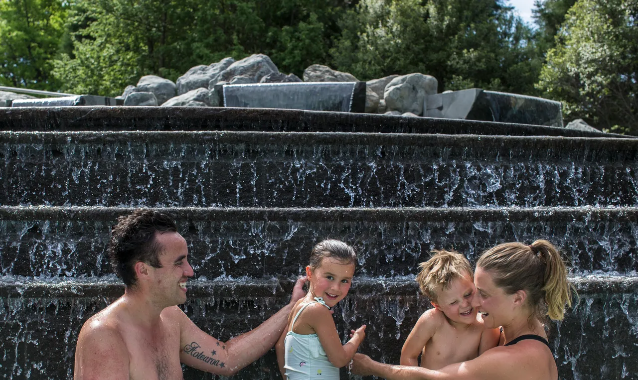 Family having fun at pools
