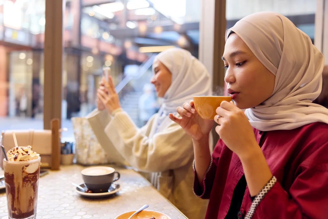 Canterbury Student - The Crossing Drinking Coffee