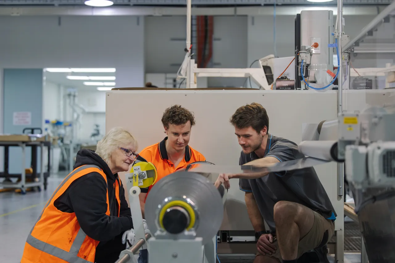 Engineers checking machine 