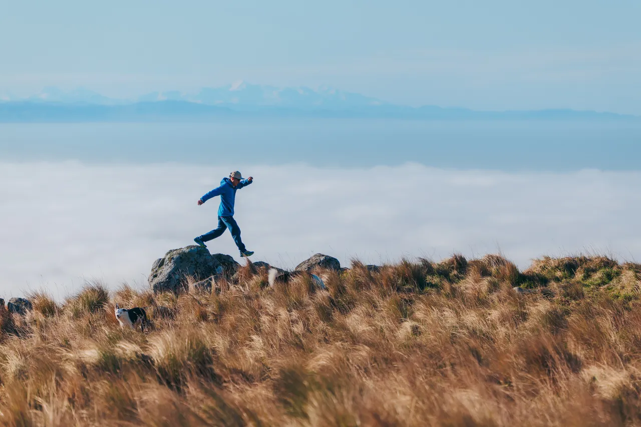 Man skipping on rocks 