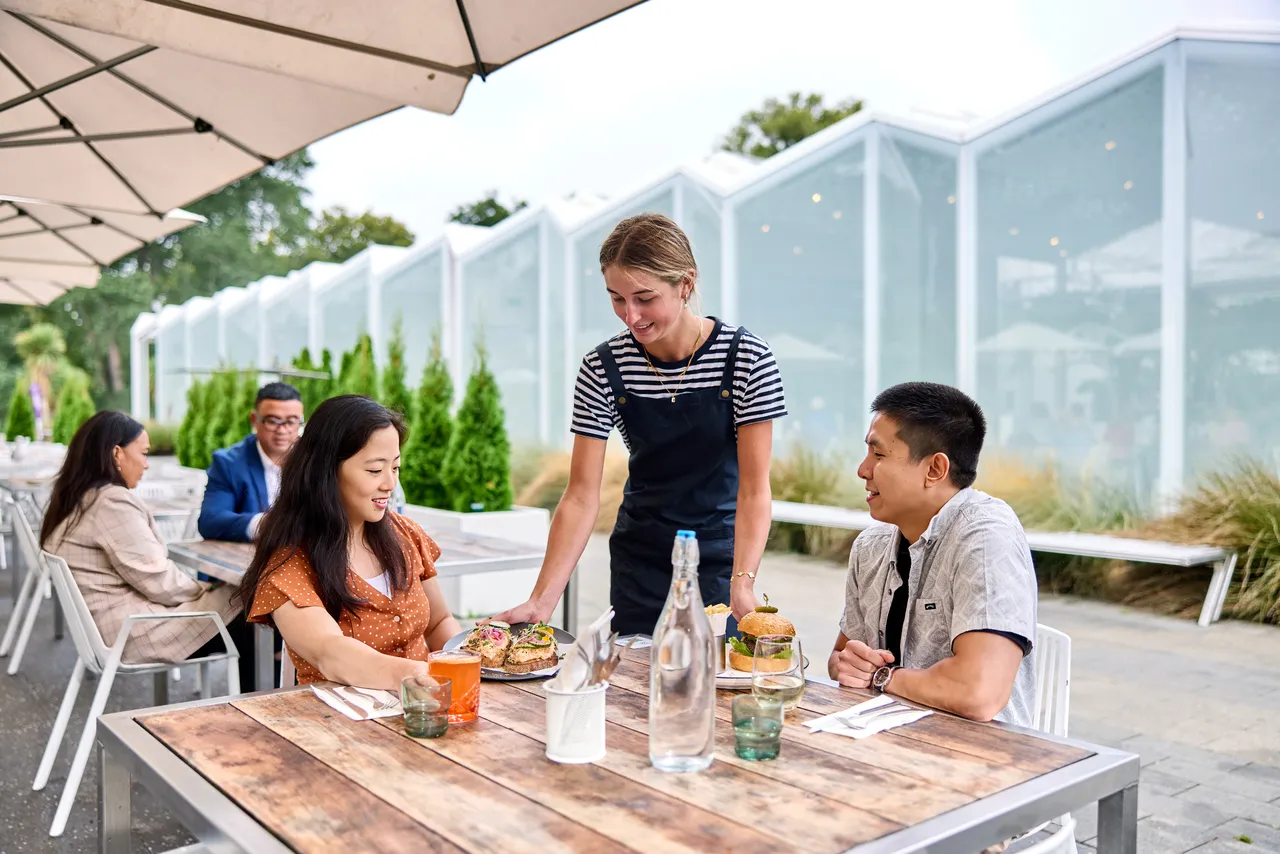 Couple served food at Ilex Café