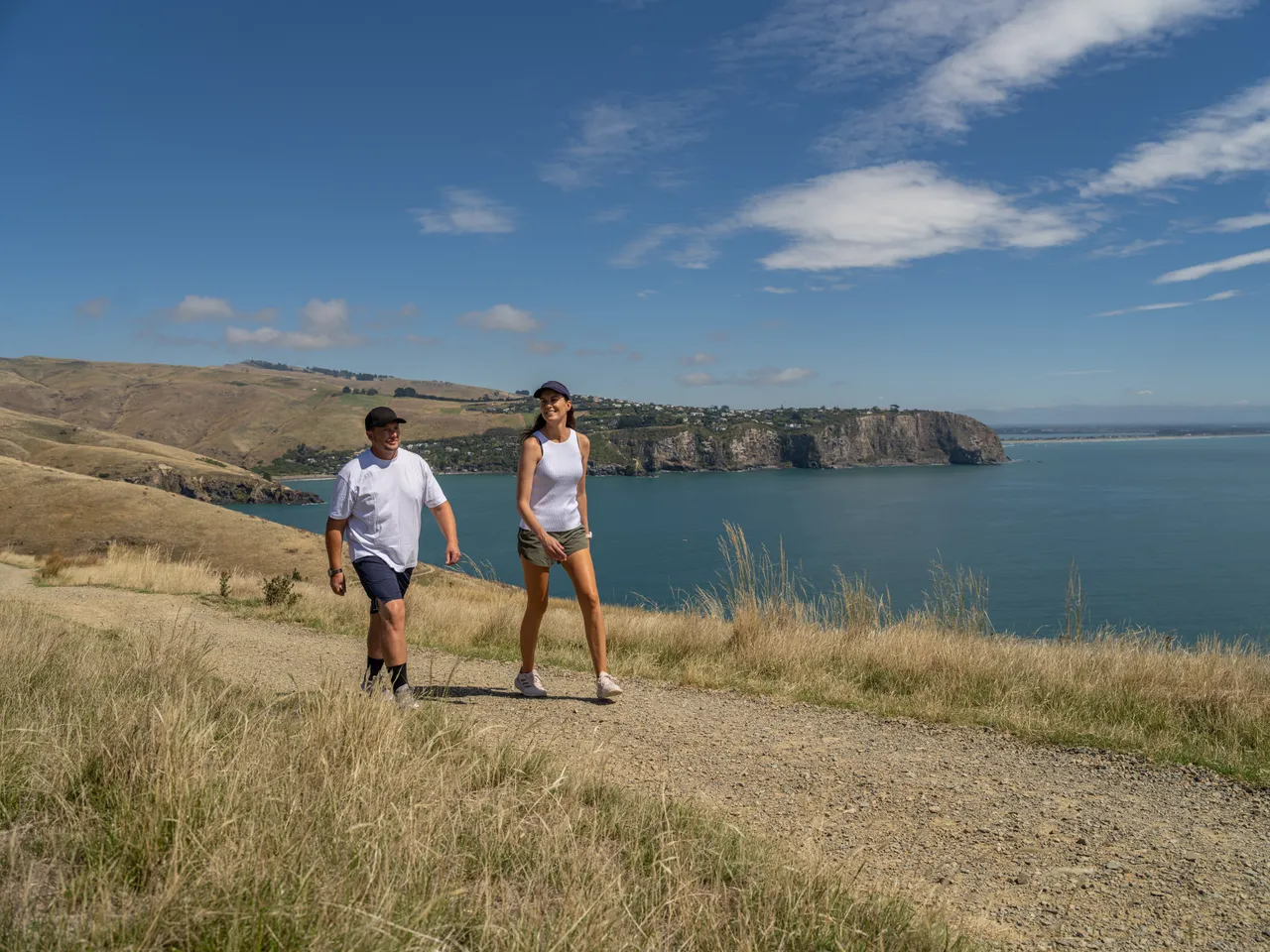 Couple hiking at Godley Head Track