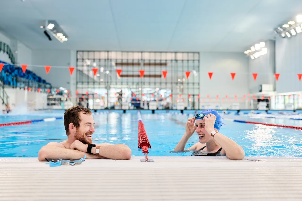Man and woman in the competition pool at Parakiore