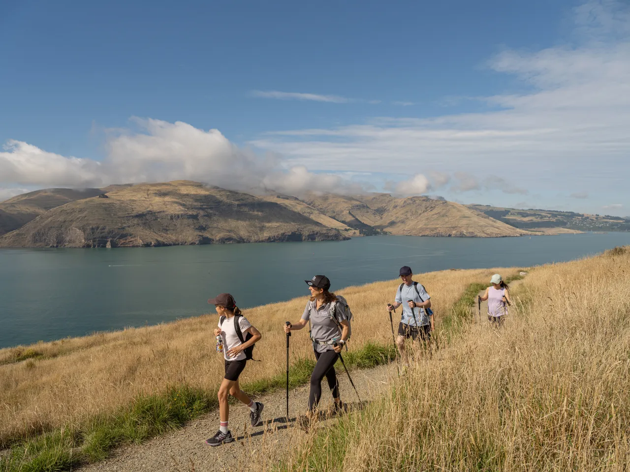 Family hiking at Godley Head Track with Crater Rim Walks