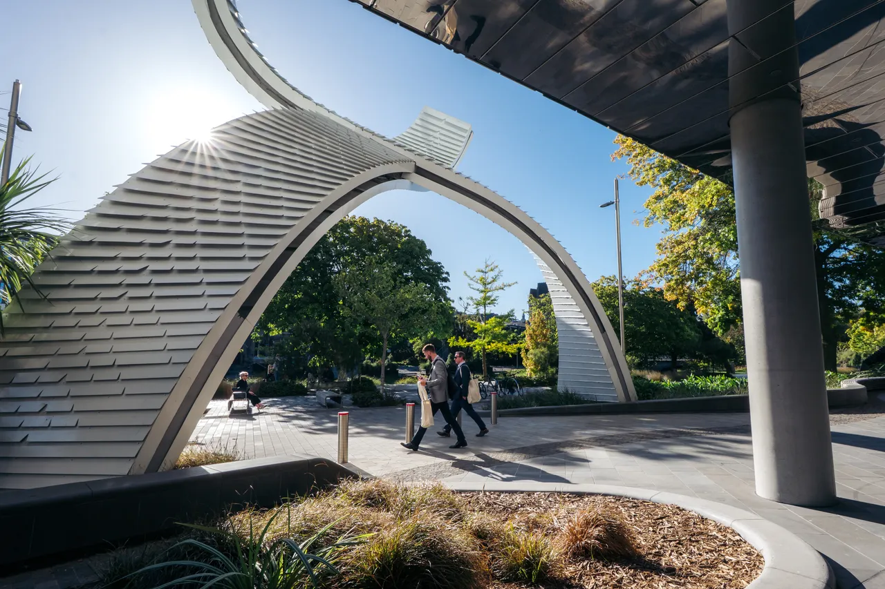 Delegates walking by Te Pae Christchurch Convention Centre