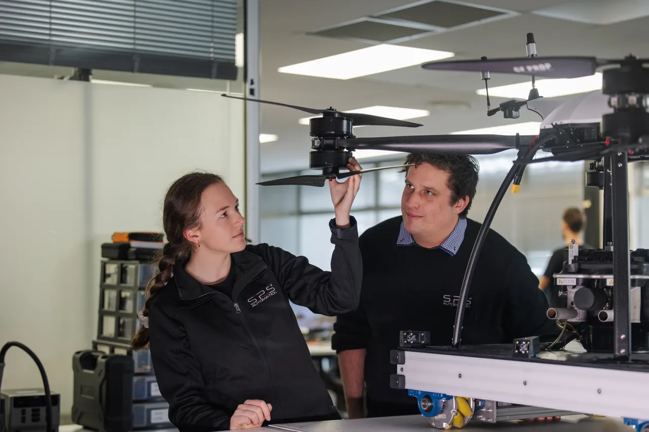 Engineers working on a drone