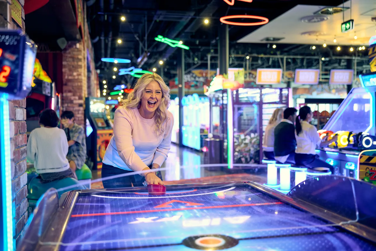 Adult having fun at Archie Brothers