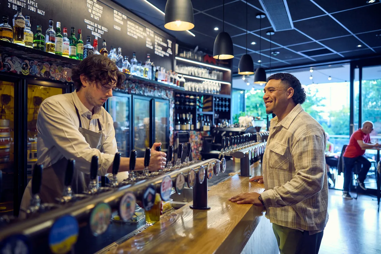 Man orders at the Bar