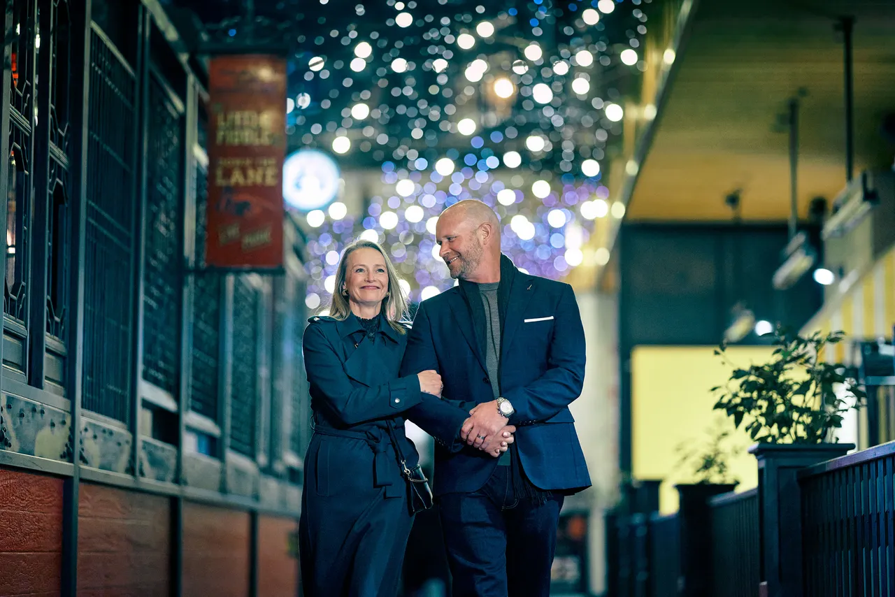 Couple Walking under lights_517