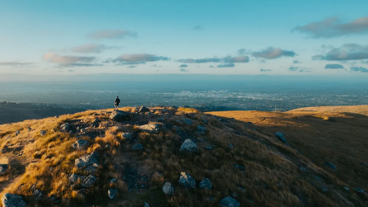 Person on top of Port Hills