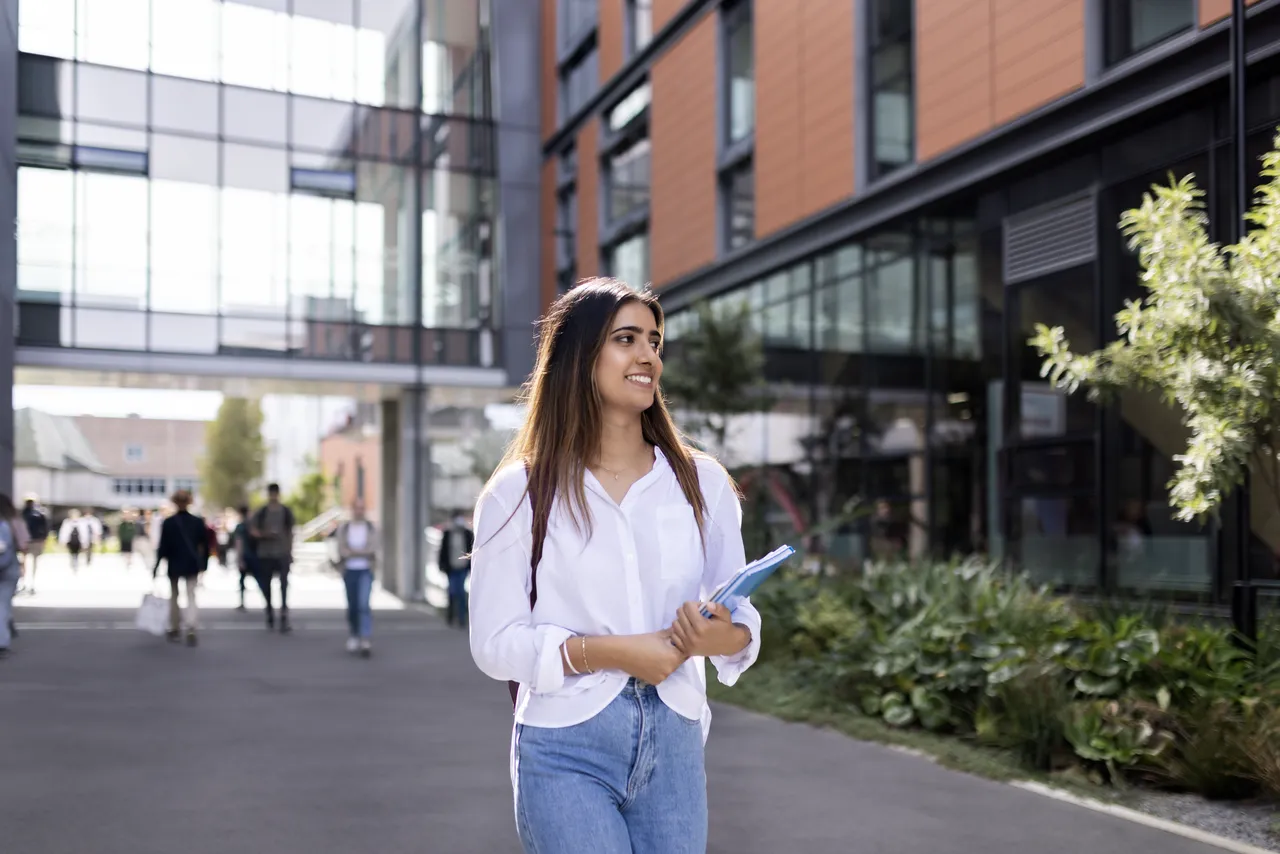 Tertiary student walking in campus