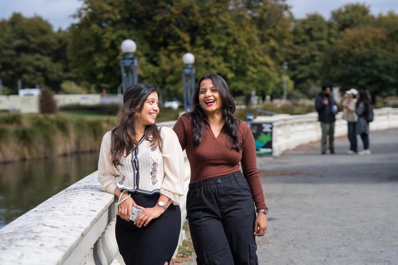 Students hanging by Ōtākaro Avon River