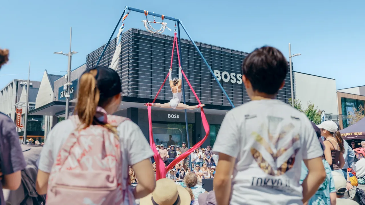 Kids watching perfomers at World Buskers Festival