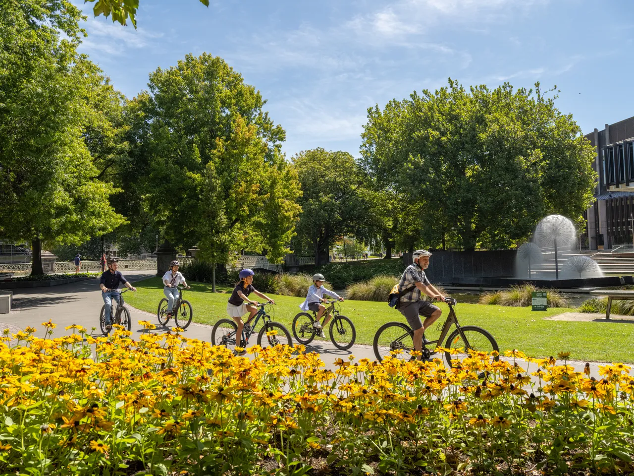 Family biking in Victoria Square with Chill Explore