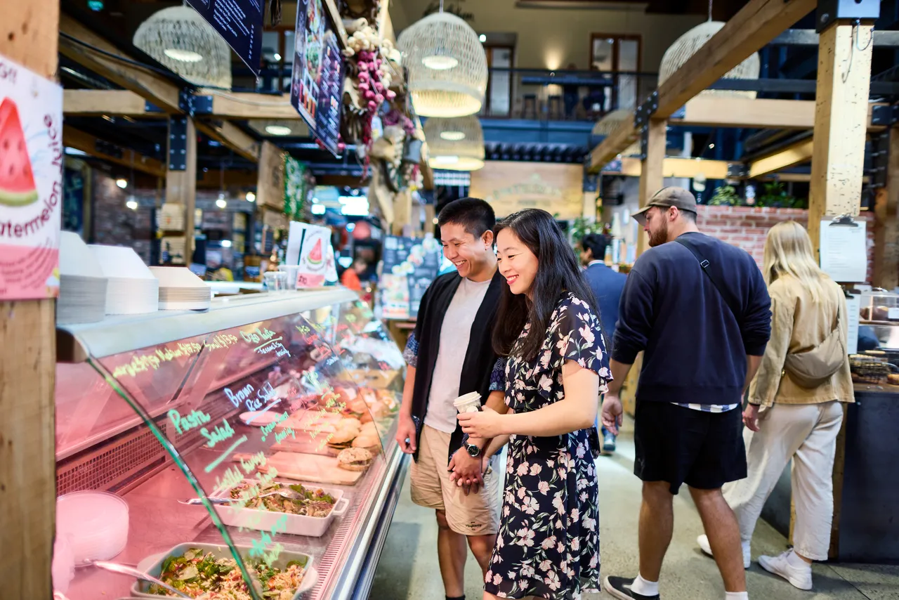 Couple exploring the Riverside Market