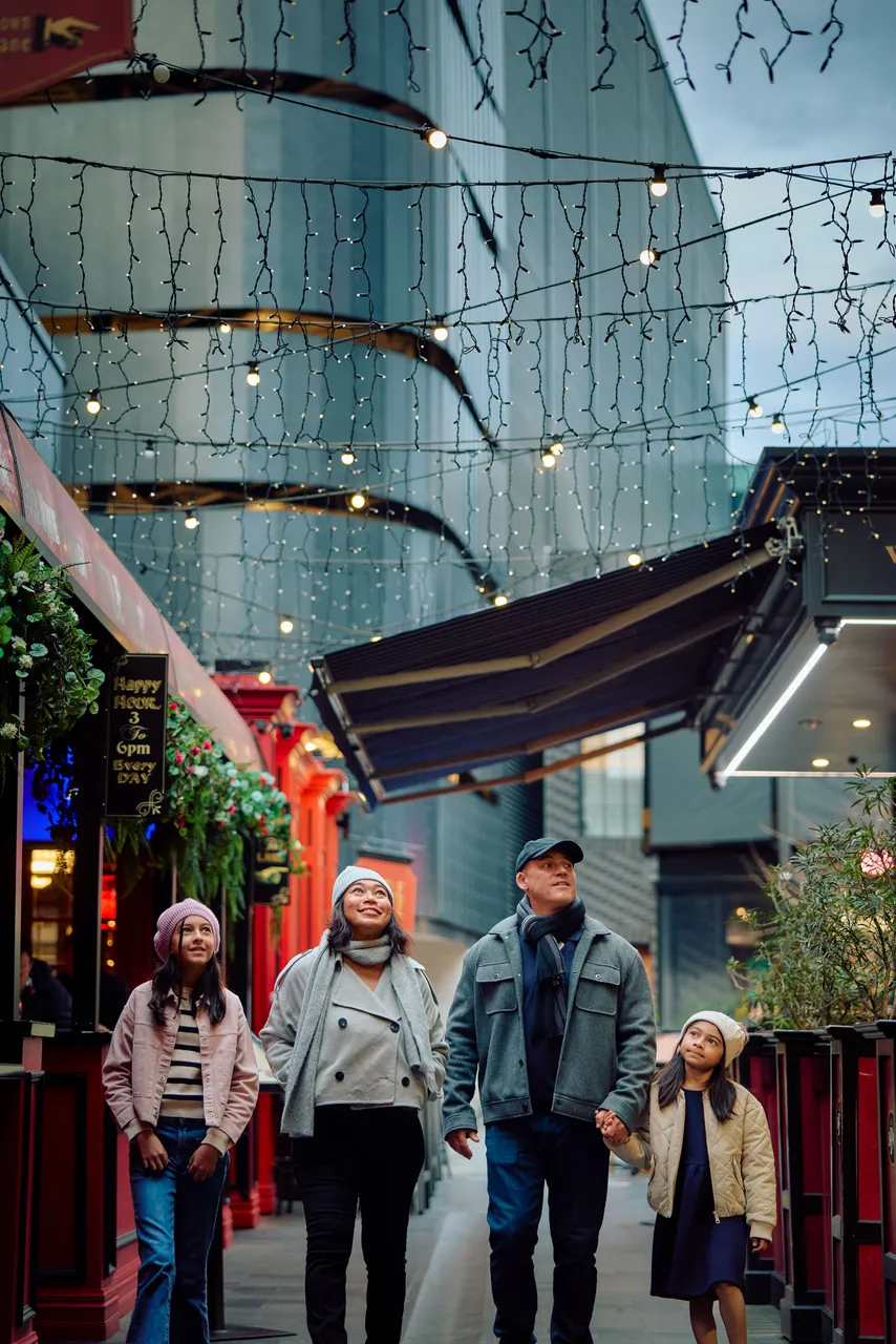 Family walking along Terrace lane