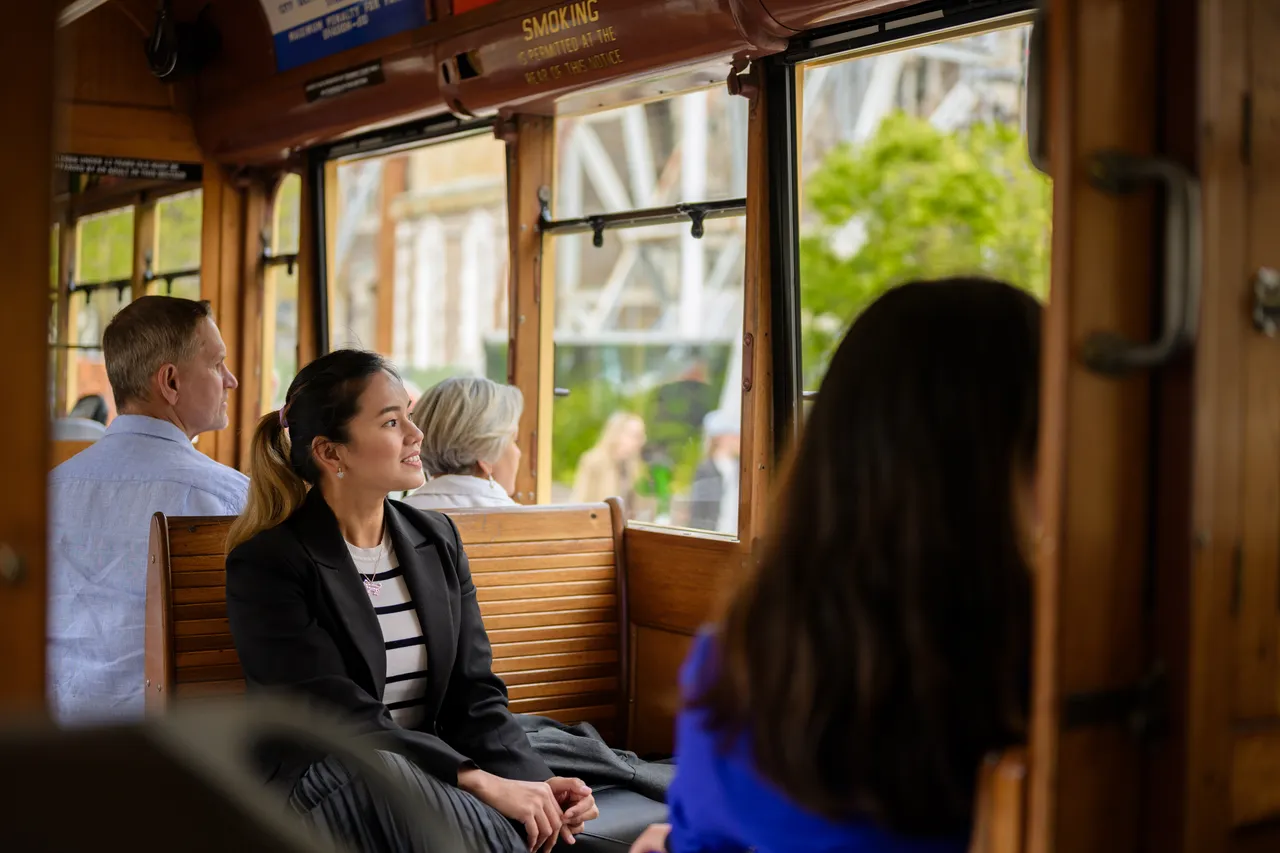 Conference participant in city tram tour