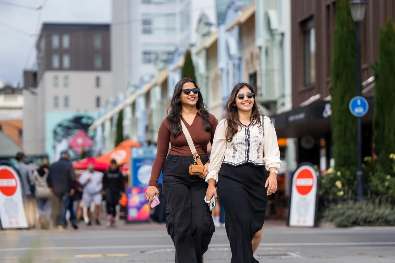Students strolling by New Regent St