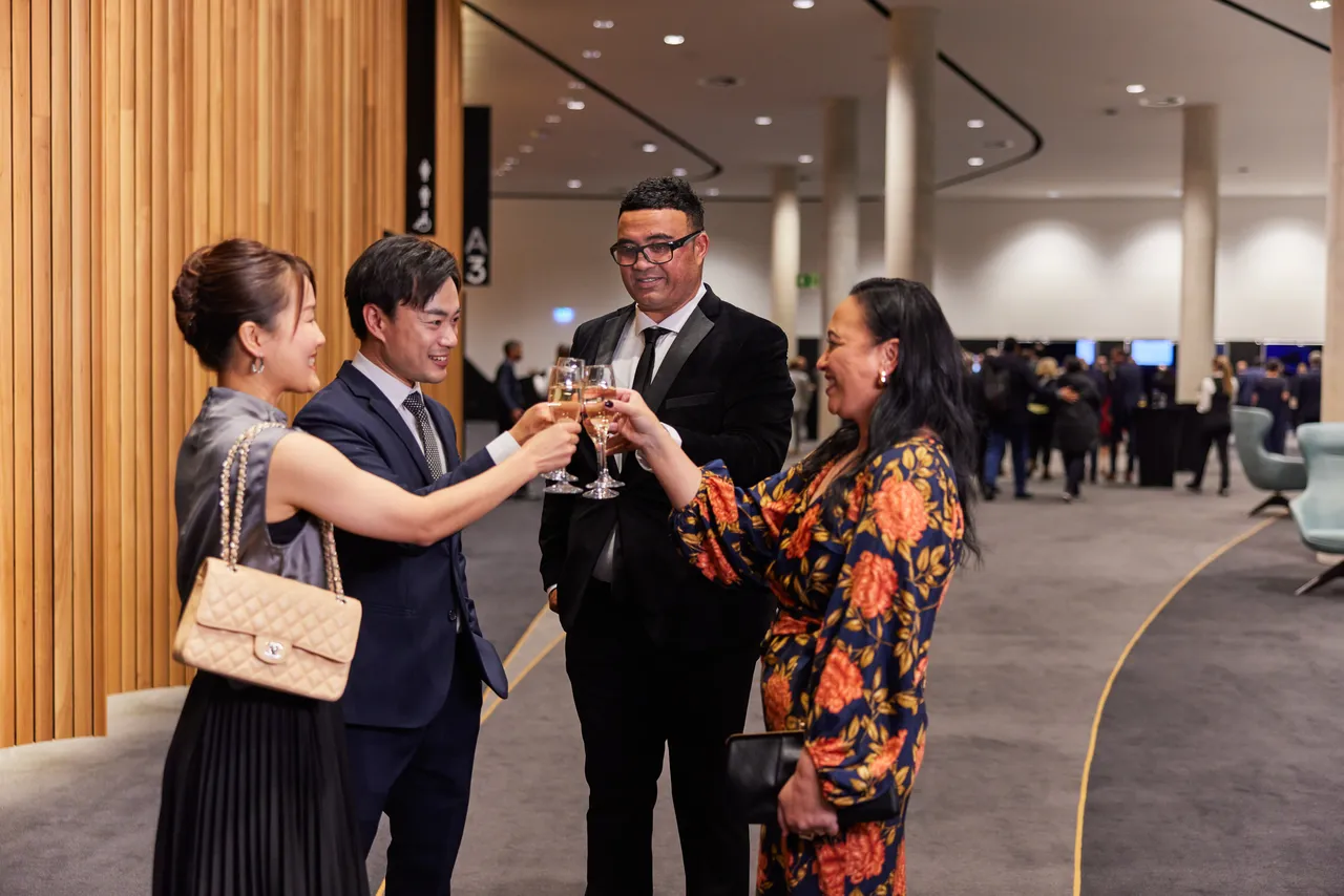 Enjoying drinks before a gala dinner