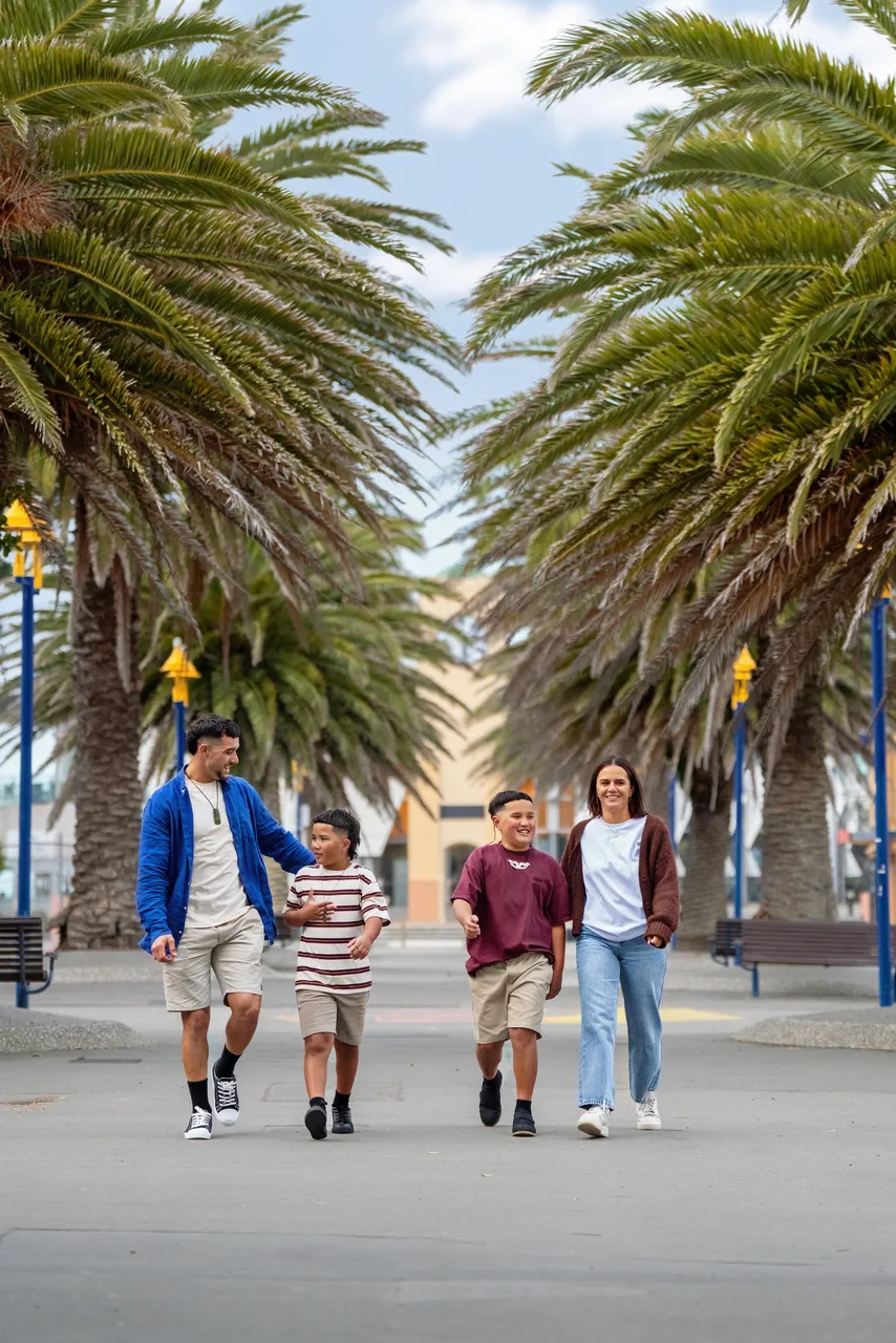 Family strolling in New Brighton 
