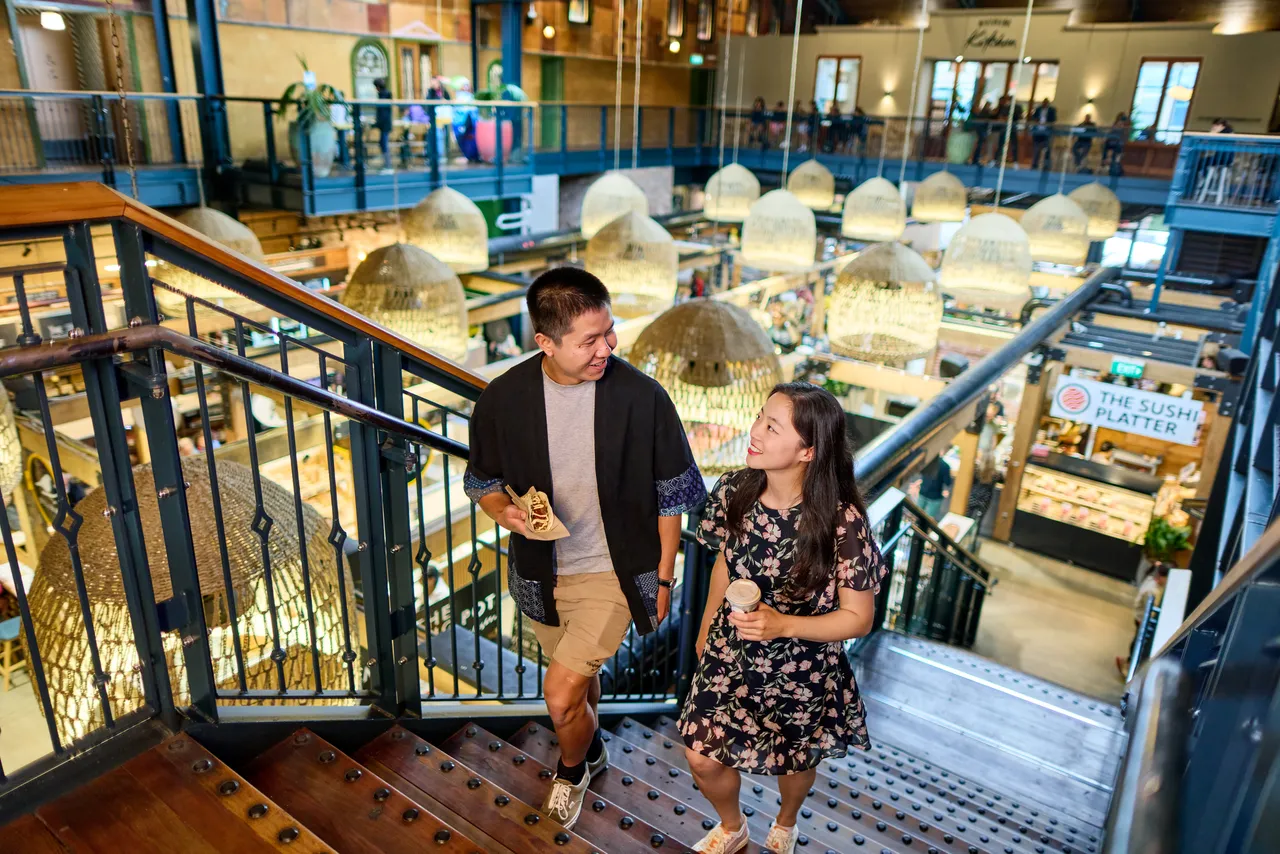 Couple exploring the Riverside Market