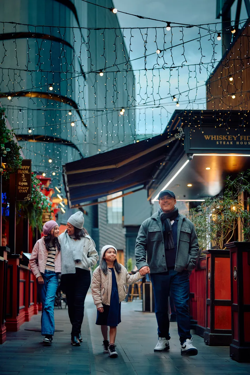 Family walking along Terrace lane