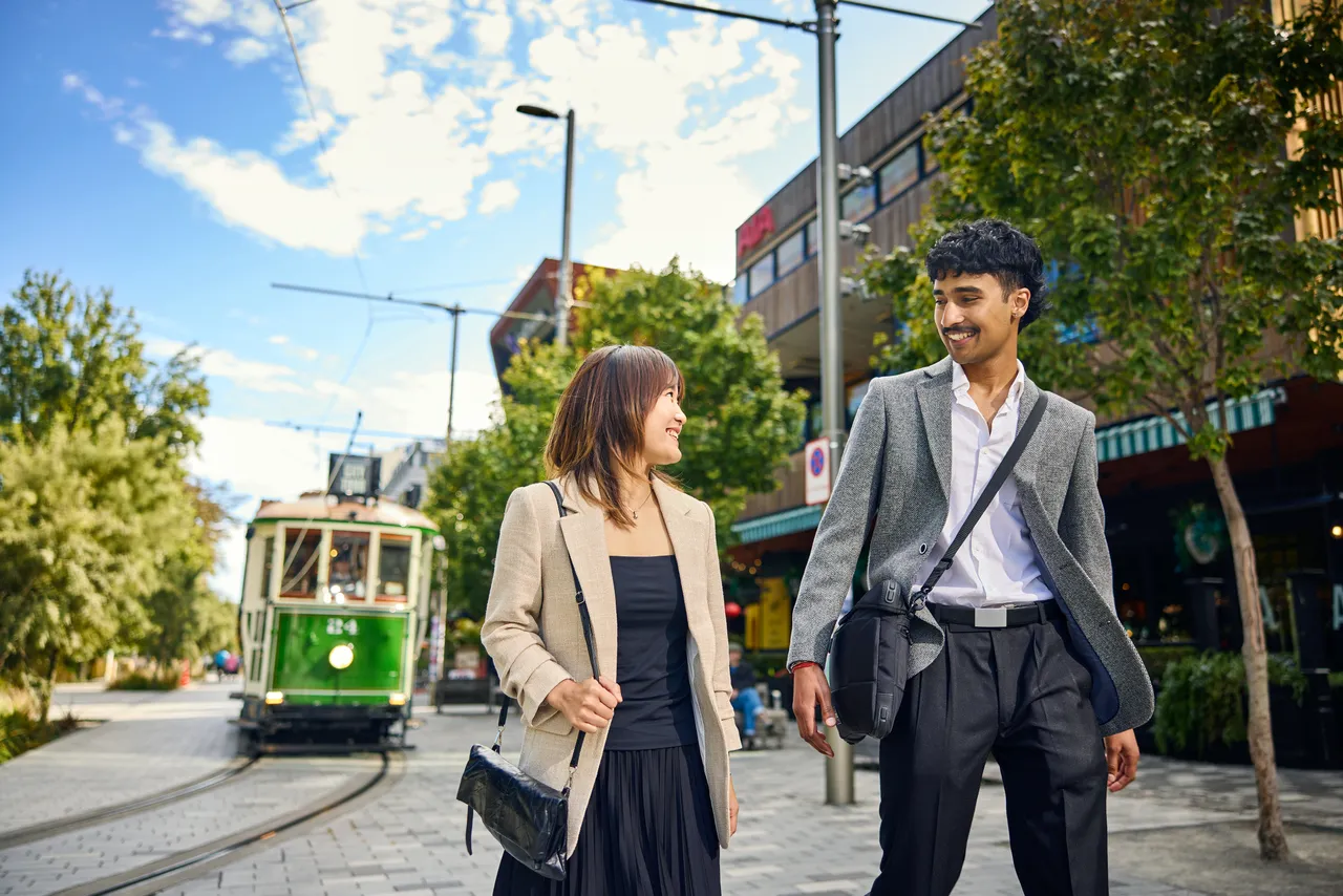 Colleagues strolling along Oxford Terrace