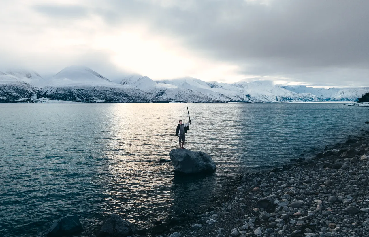 Frodo Standing on Rock at Lake Pukaki 