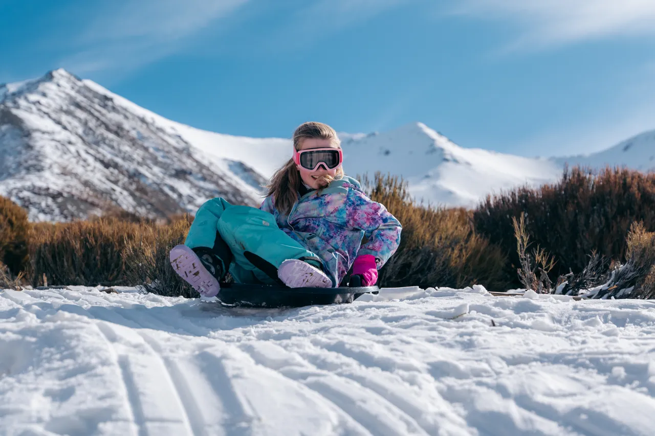Child tobogganing