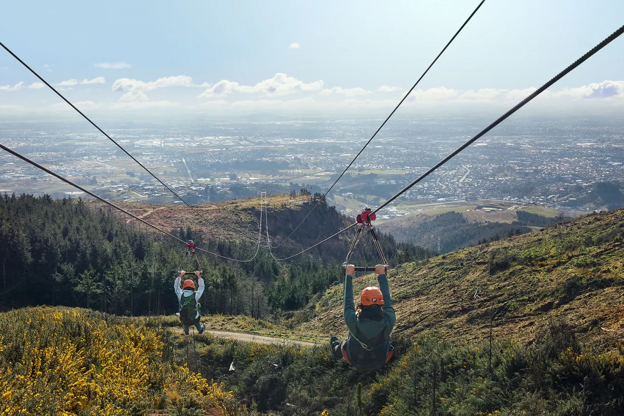 Mum and child ziplining